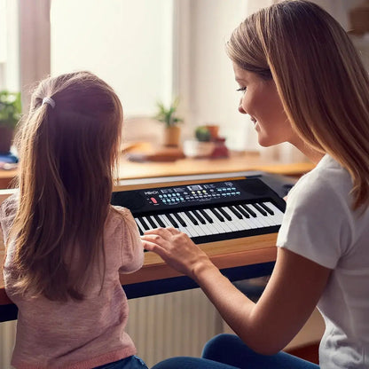 Teclado órgano musical infantil a pila con micrófono